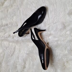 Cole Haan Nike Air Black cap toe sling backs.